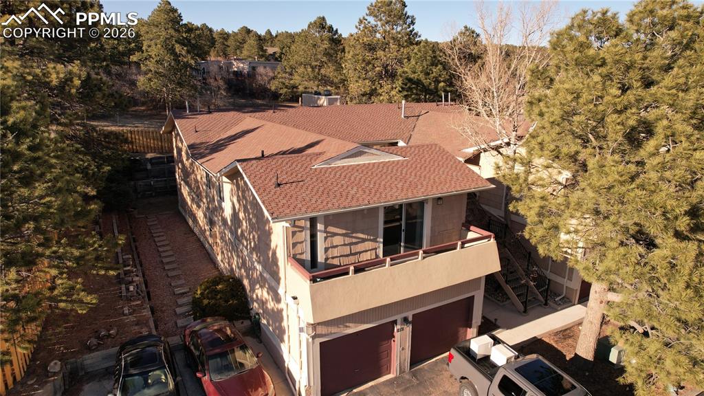 1682 Deer Creek Road Monument, CO 80132 - Photo 33 of 38 an aerial view of a house with a yard