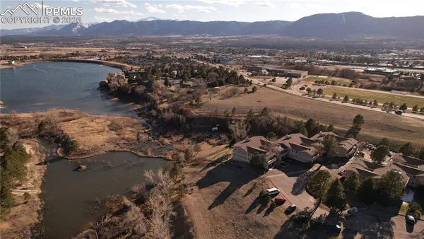 an aerial view of city and lake view