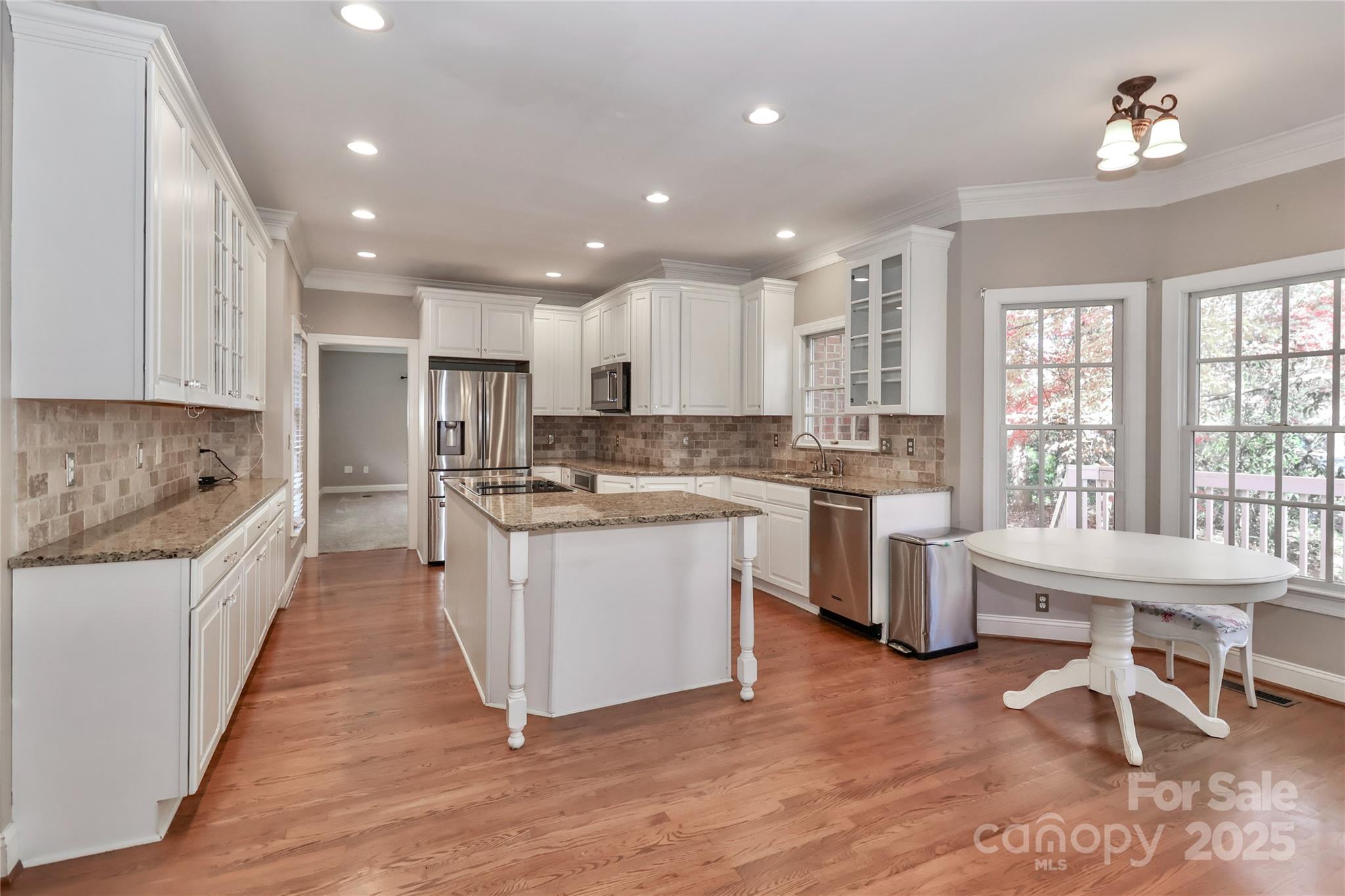 625 St Andrews Road Statesville, NC 28625 - Photo 13 of 48 a kitchen with a sink window and cabinets