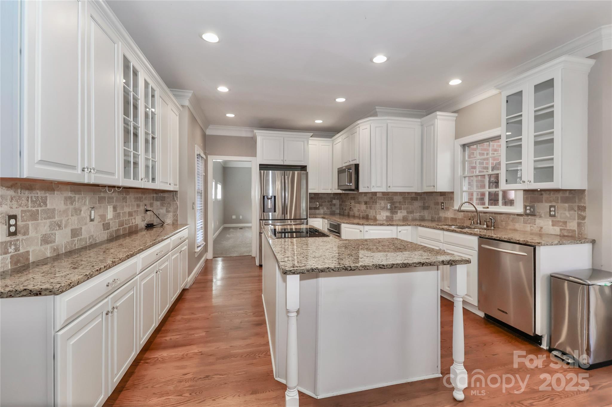 625 St Andrews Road Statesville, NC 28625 - Photo 14 of 48 a large kitchen with stainless steel appliances granite countertop a sink and a stove