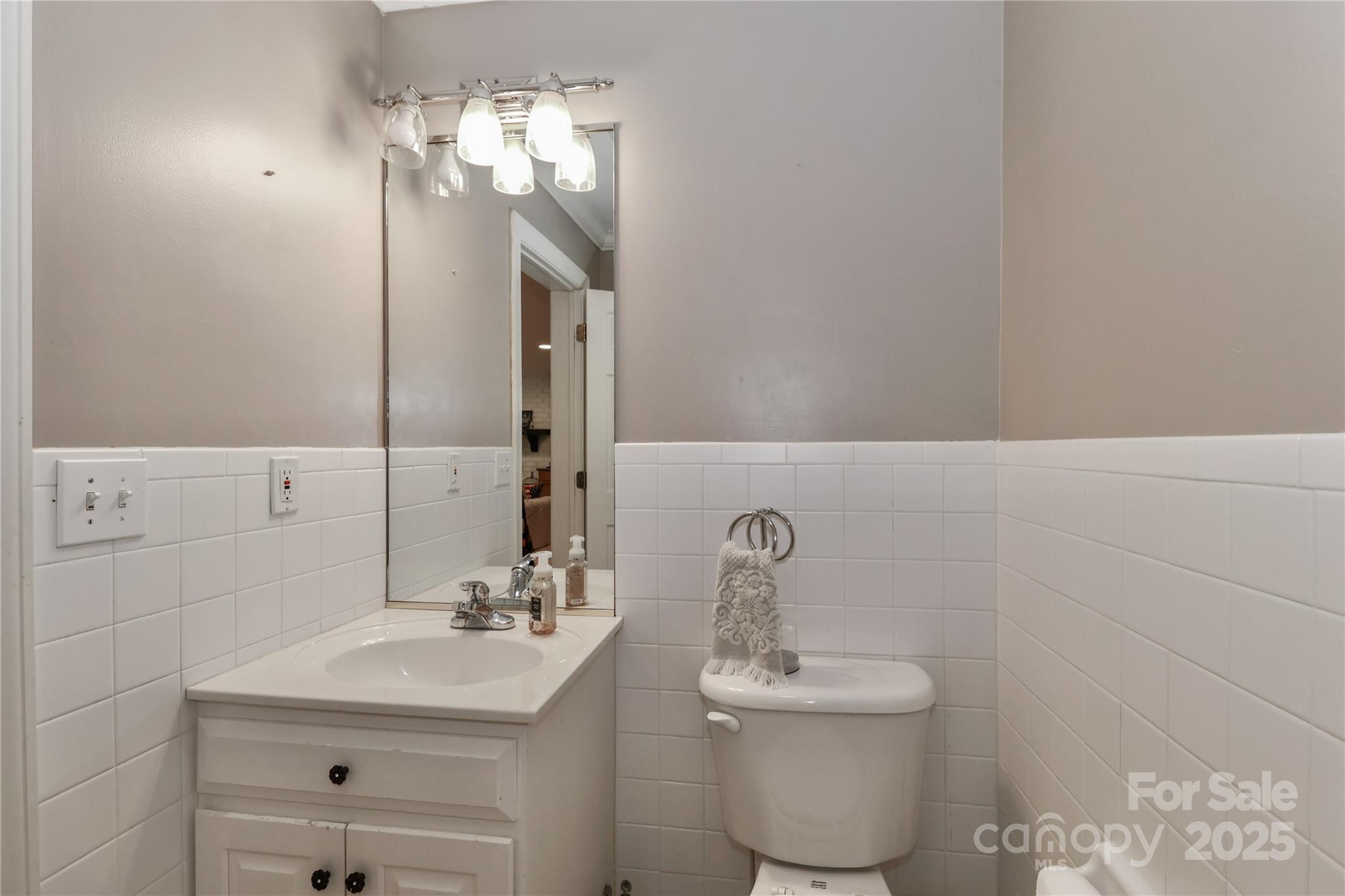 625 St Andrews Road Statesville, NC 28625 - Photo 37 of 48 a bathroom with a sink toilet and a mirror