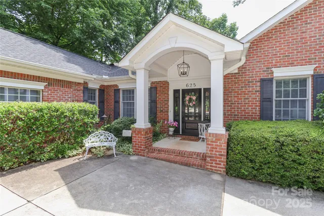 a view of house with outdoor space and porch