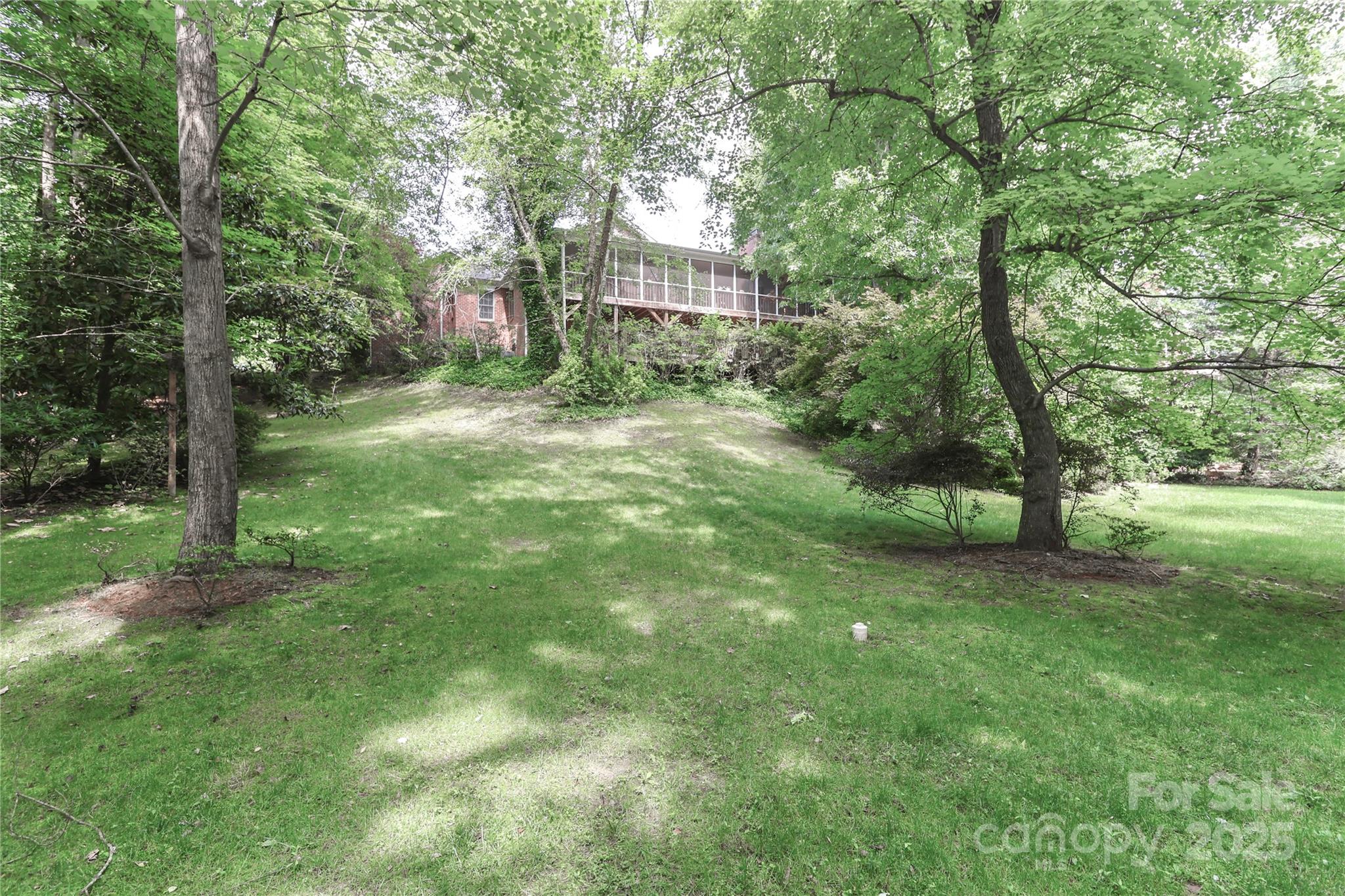 625 St Andrews Road Statesville, NC 28625 - Photo 47 of 48 a view of a yard in front of a house with large trees
