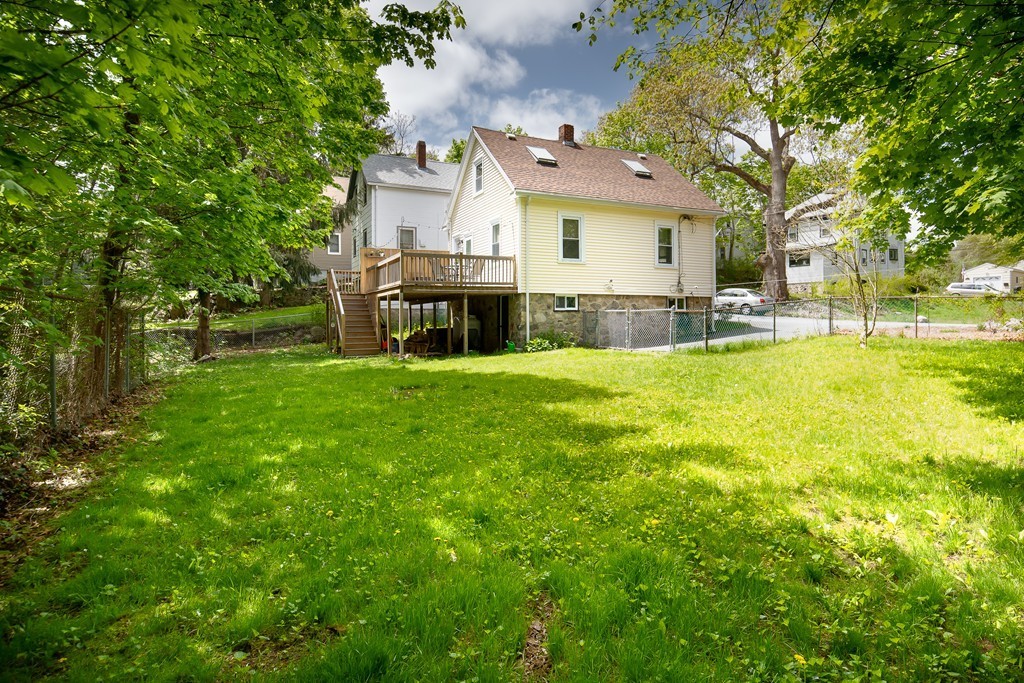 79 Colonial Drive Dedham, MA 02026 - Photo 12 of 12 a view of a house with a yard patio and sitting area