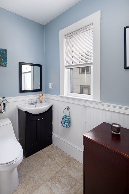 79 Colonial Drive Dedham, MA 02026 - Photo 5 of 12 a bathroom with a sink and a toilet