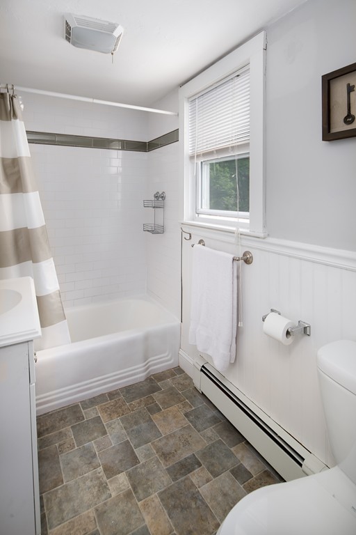 79 Colonial Drive Dedham, MA 02026 - Photo 8 of 12 a bathroom with a bathtub and a shower