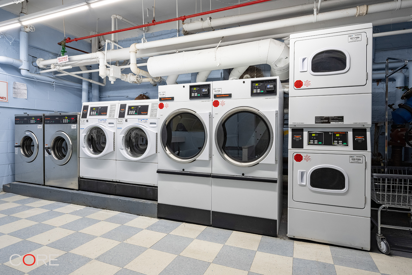 230 West 105th Street, Unit 5AA Manhattan, NY 10025 - Photo 6 of 9 a utility room with dryer and washer
