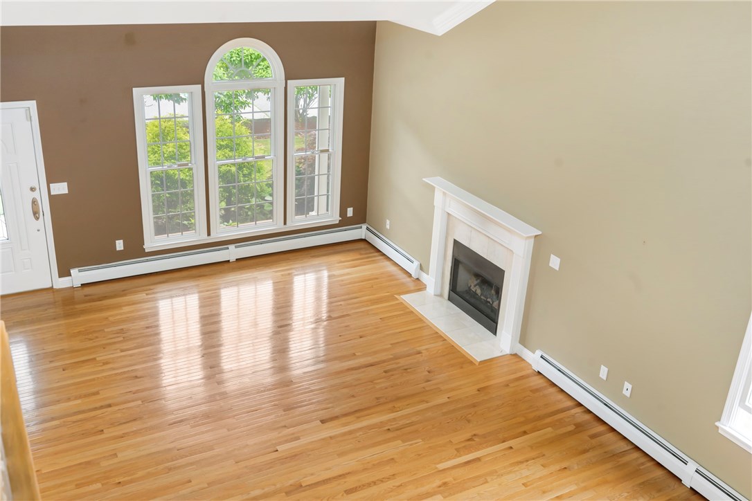 8 Abby Road Barrington, RI 02806 - Photo 7 of 38 Soaring vaulted ceilings - view to living area