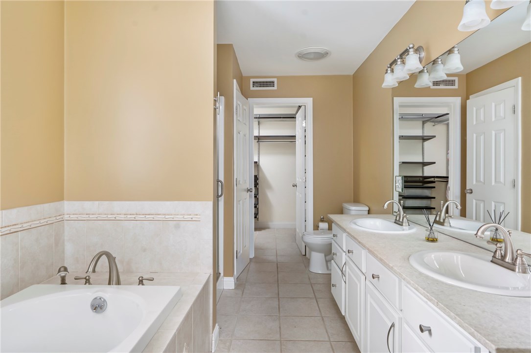 8 Abby Road Barrington, RI 02806 - Photo 9 of 38 Master bath with jetted tub, shower and large walk in closet
