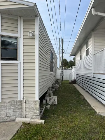 a view of a back yard of the house