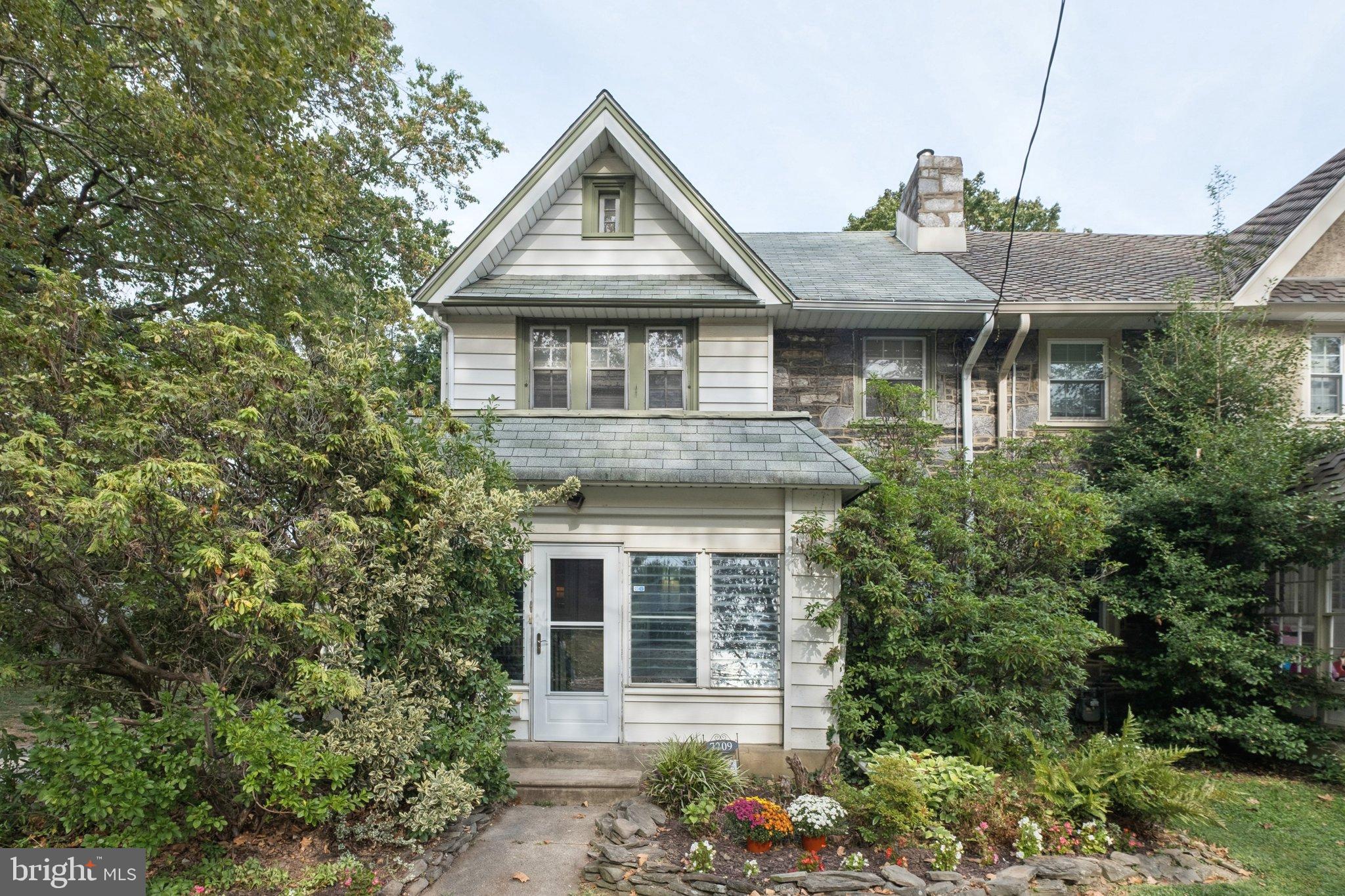 7209 Hilltop Road Upper Darby, PA 19082 - Photo 1 of 33 a front view of a house with a yard