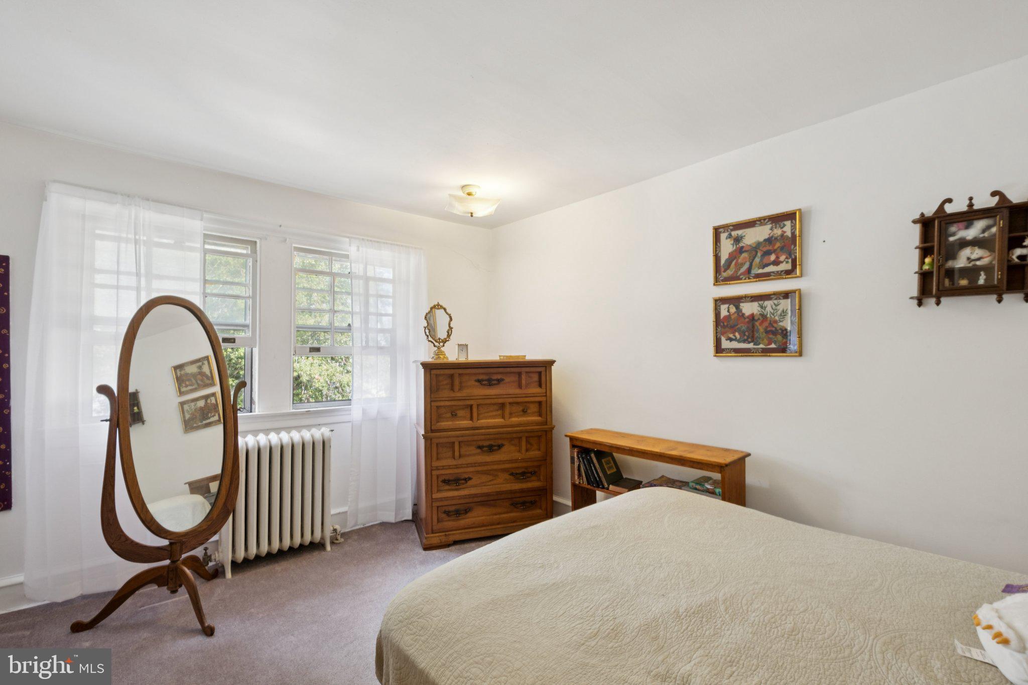 7209 Hilltop Road Upper Darby, PA 19082 - Photo 20 of 33 a bedroom with bed and a window