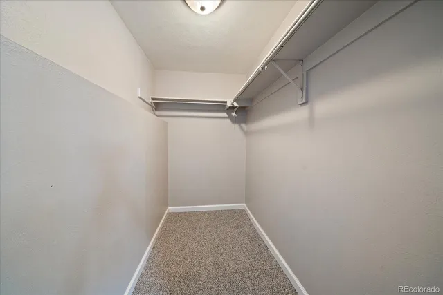 a view of a hallway with washer and dryer