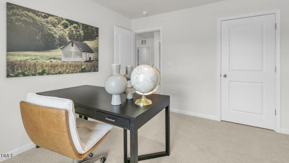 632 Ramo Grande Drive Wake Forest, NC 27587 - Photo 4 of 41 a view of a workspace