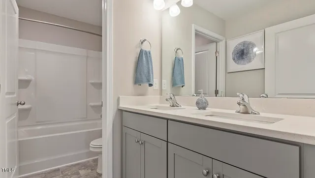a view of a livingroom with furniture and window