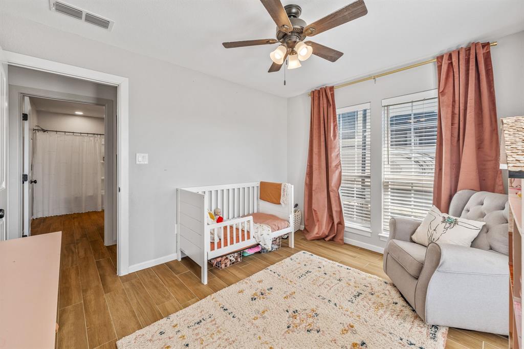 7772 County Road 179 Stephenville, TX 76401 - Photo 13 of 37 a bedroom with furniture and a window