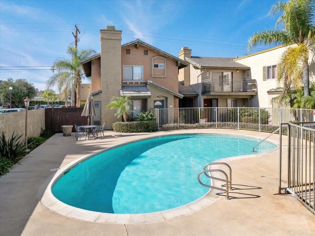 1069 Estes Street El Cajon, CA 92020 - Photo 13 of 35 a view of a house with a swimming pool
