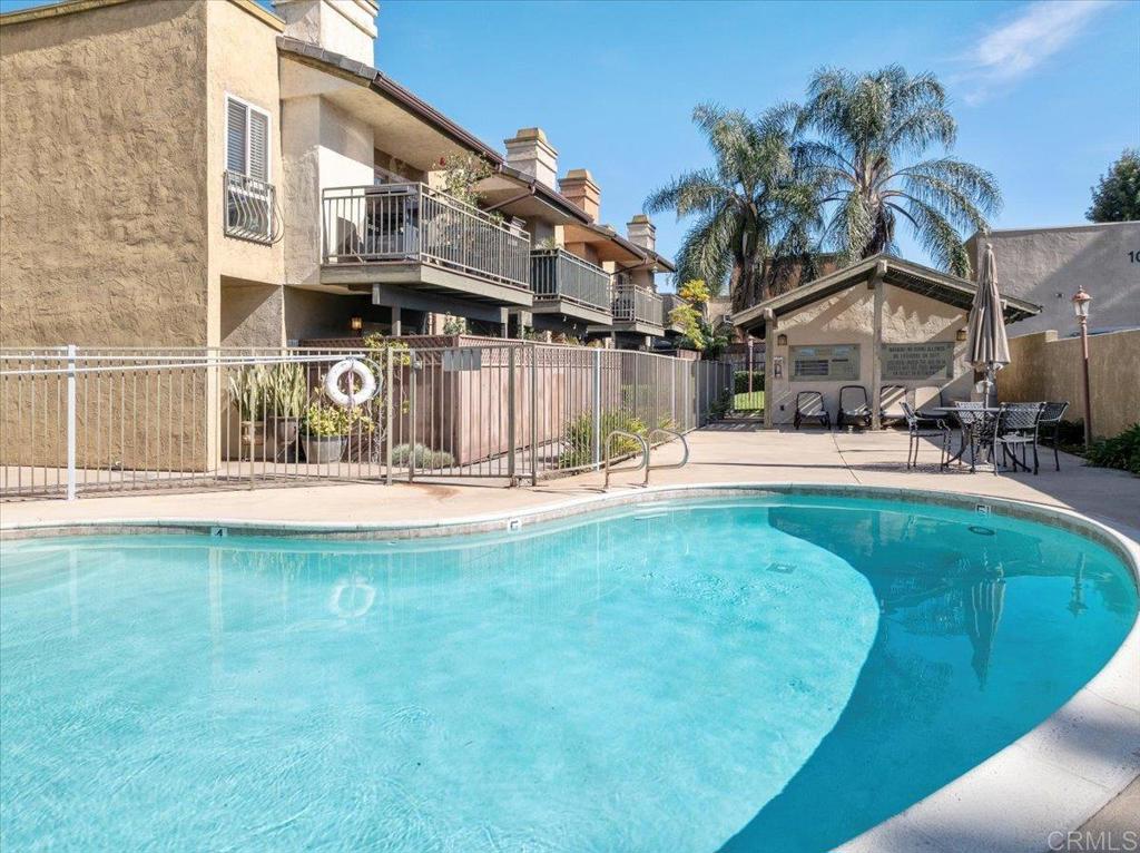 1069 Estes Street El Cajon, CA 92020 - Photo 15 of 35 a view of a house with a swimming pool