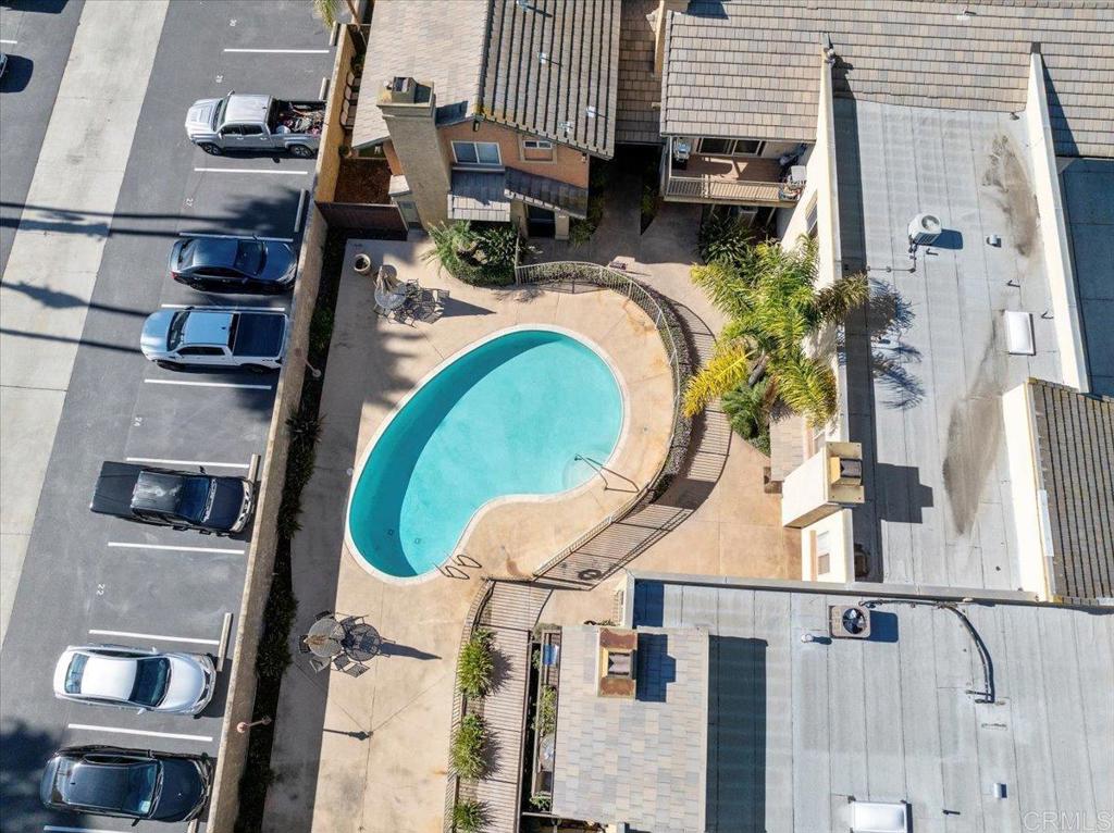 1069 Estes Street El Cajon, CA 92020 - Photo 20 of 35 an aerial view of a swimming pool with outdoor seating and city view