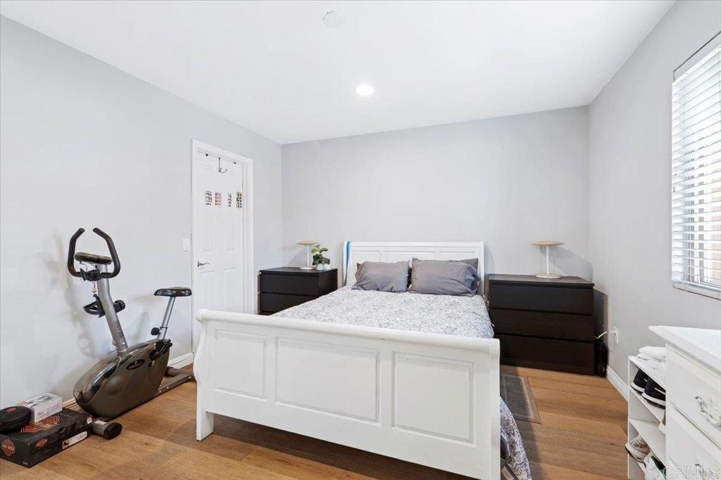 1069 Estes Street El Cajon, CA 92020 - Photo 2 of 35 a bedroom with a bed and a dresser