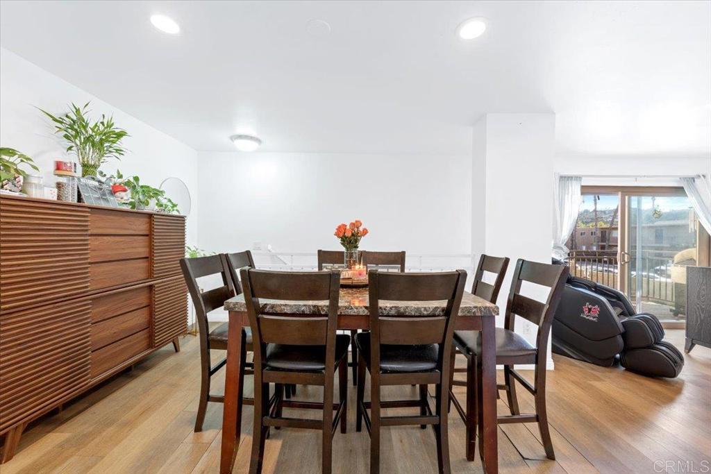 1069 Estes Street El Cajon, CA 92020 - Photo 27 of 35 a view of a dining room with furniture and wooden floor