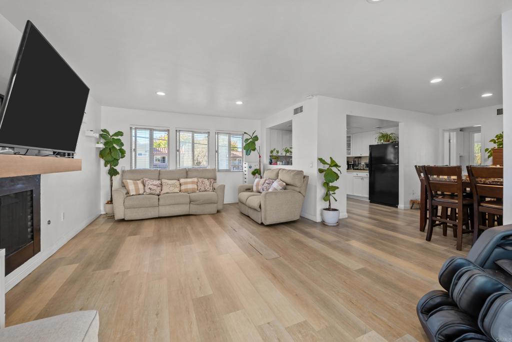 1069 Estes Street El Cajon, CA 92020 - Photo 27 of 41 a living room with furniture and a flat screen tv