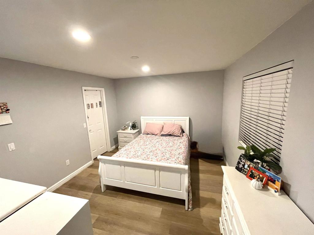 1069 Estes Street El Cajon, CA 92020 - Photo 3 of 41 a bedroom with a bed and a dresser