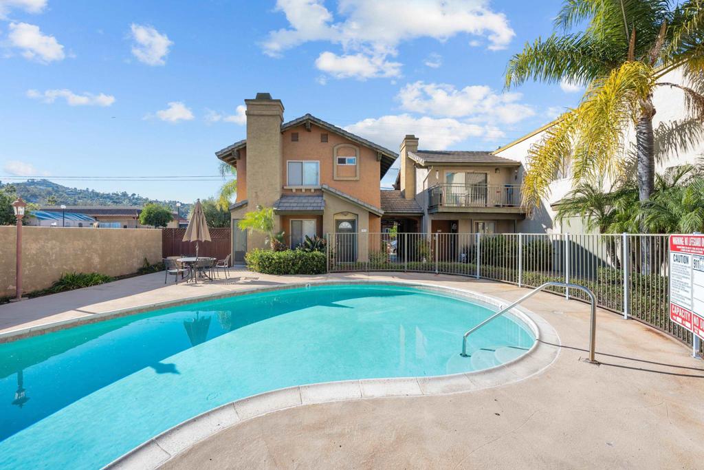 1069 Estes Street El Cajon, CA 92020 - Photo 35 of 41 a view of a house with a swimming pool