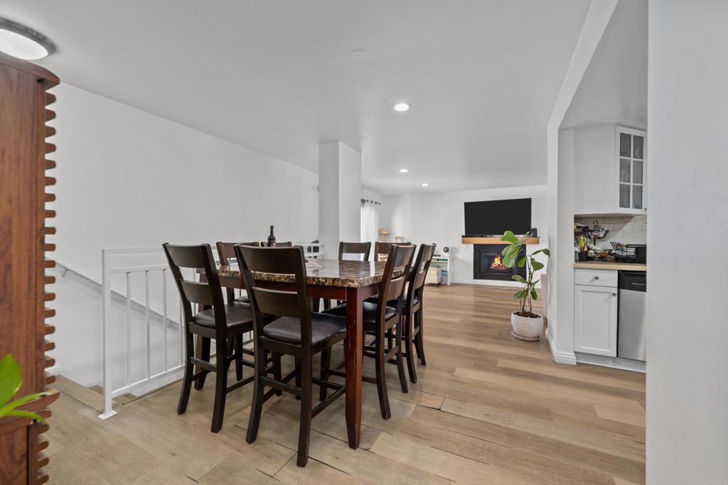 1069 Estes Street El Cajon, CA 92020 - Photo 39 of 41 a view of a dining room with furniture and wooden floor