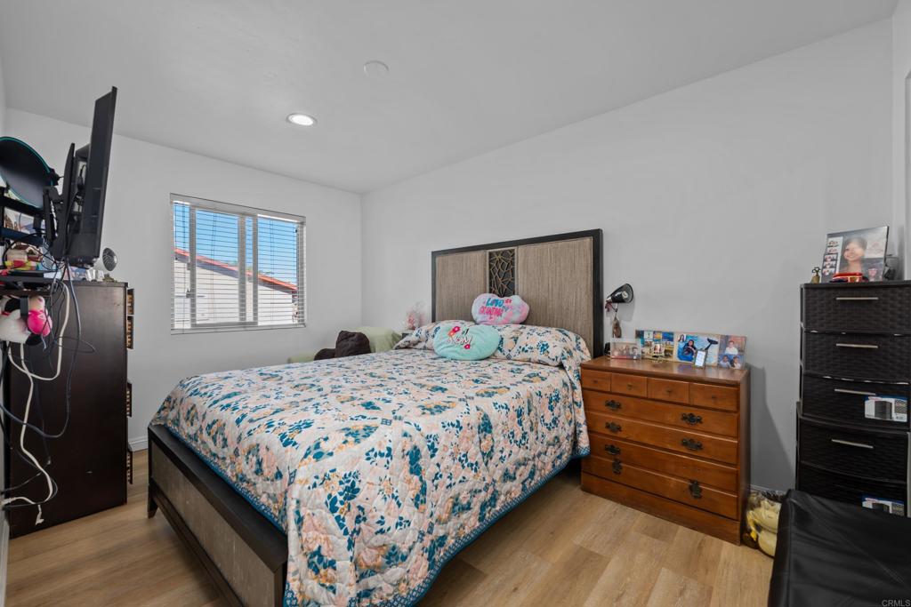 1069 Estes Street El Cajon, CA 92020 - Photo 41 of 41 a bedroom with a bed and a window