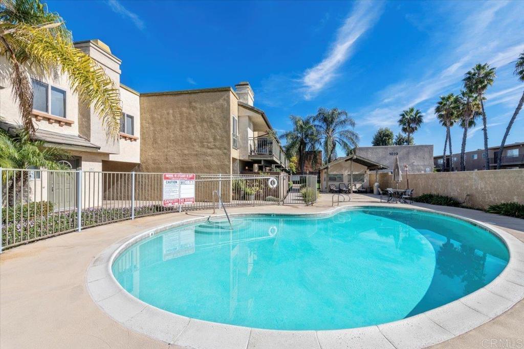 1069 Estes Street El Cajon, CA 92020 - Photo 7 of 35 a view of a swimming pool with outdoor seating