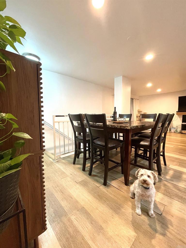 1069 Estes Street El Cajon, CA 92020 - Photo 9 of 41 a view of a dinning table and chairs in the patio