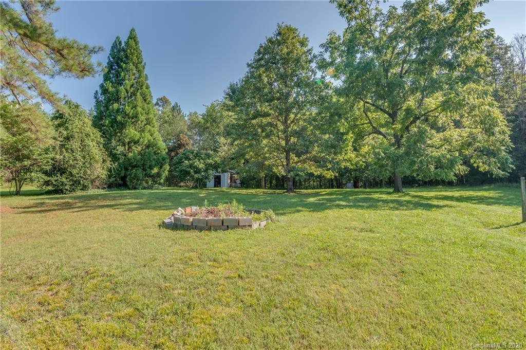 549 King Stepp Road Mill Spring, NC 28756 - Photo 40 of 47 a view of a swimming pool with a yard