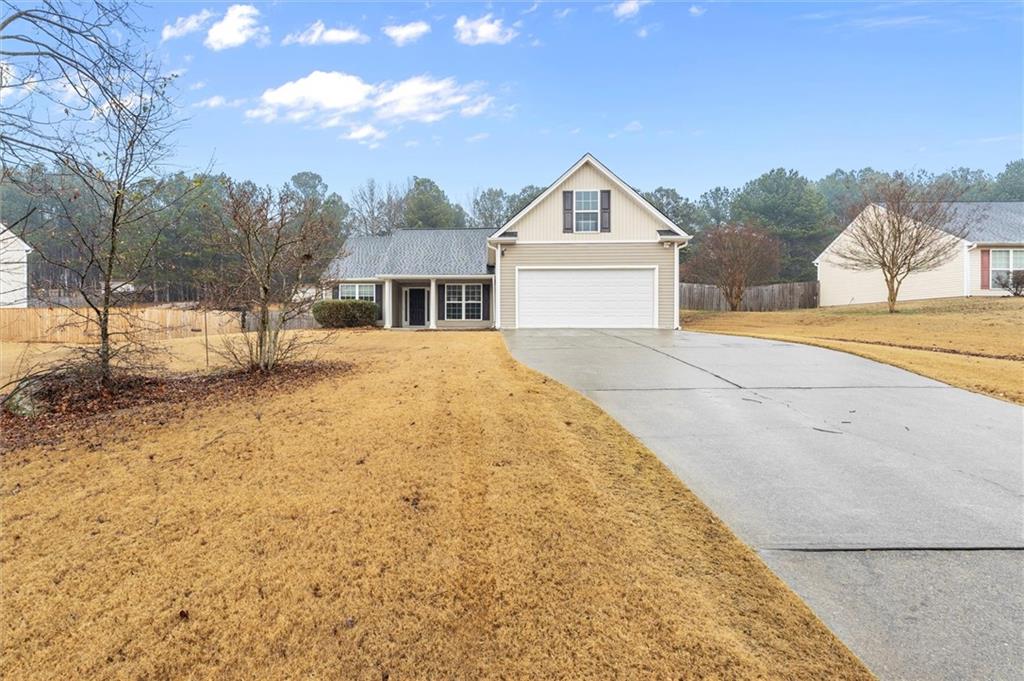923 Downing Drive Bethlehem, GA 30620 - Photo 36 of 39 a front view of a house with a yard