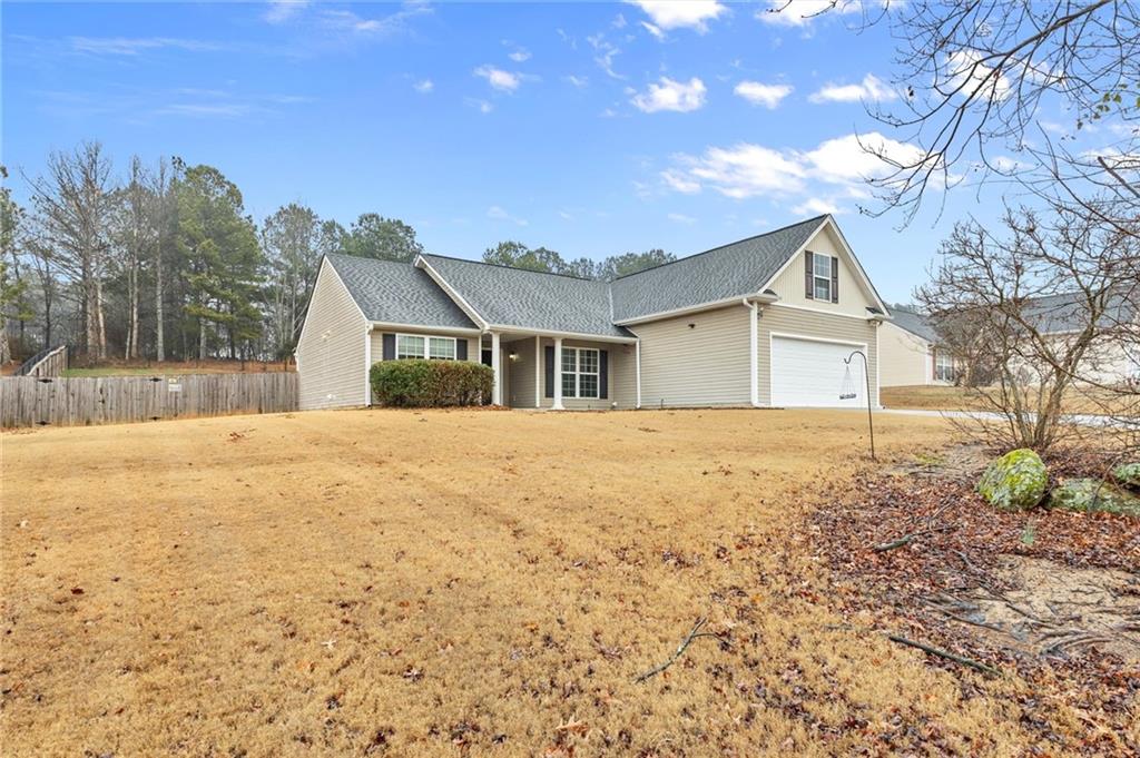 923 Downing Drive Bethlehem, GA 30620 - Photo 39 of 39 a house with yard in front of it