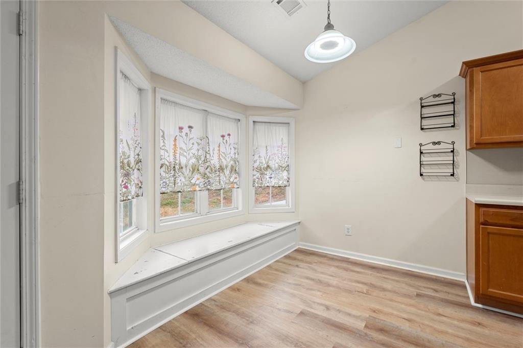 923 Downing Drive Bethlehem, GA 30620 - Photo 6 of 39 a view of a room with wooden floor and windows