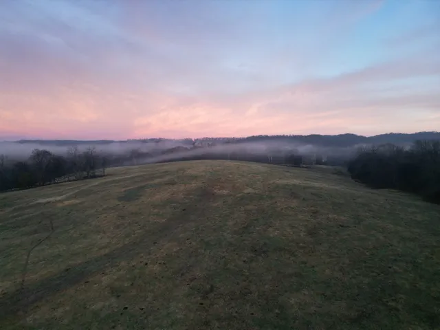 a view of an outdoor space and mountain view
