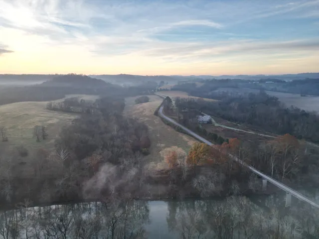 a view of an ocean and mountain