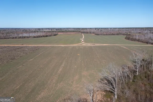 a view of a swimming pool and an ocean view