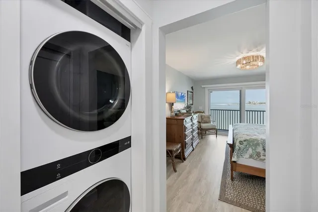 a view of livingroom with washer and dryer