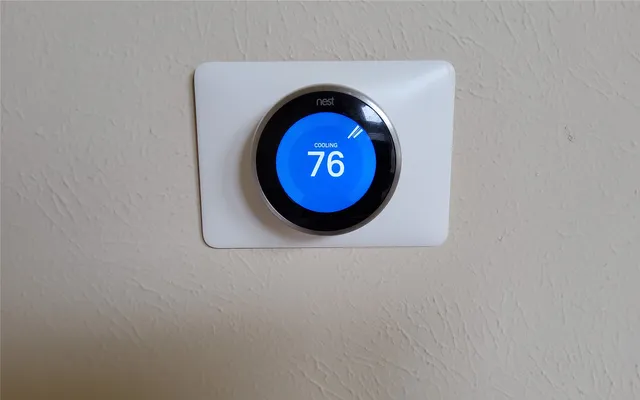 a living room with a couch and a wooden floor