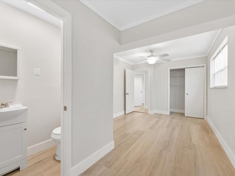 311 West Sample Road Deerfield Beach, FL 33064 - Photo 25 of 34 a view of an empty room and a gallery