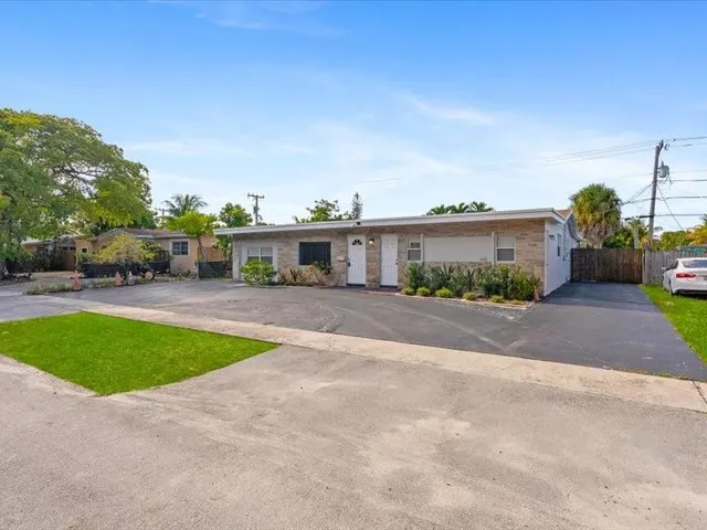 a view of house with outdoor space and street view