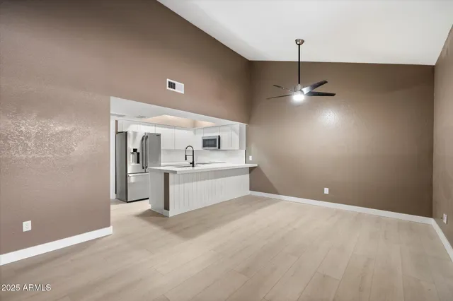 a view of a livingroom with a furniture