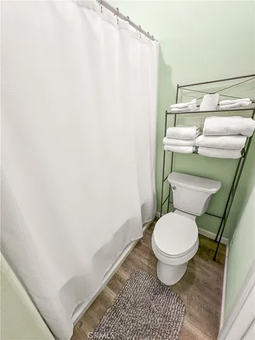 a bathroom with a toilet and a sink