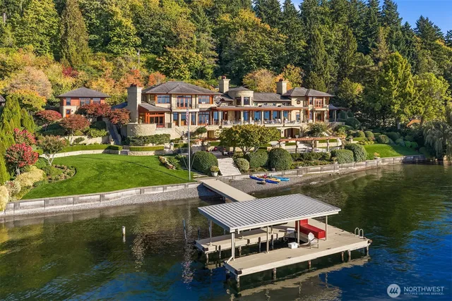 a aerial view of a house with swimming pool garden and patio