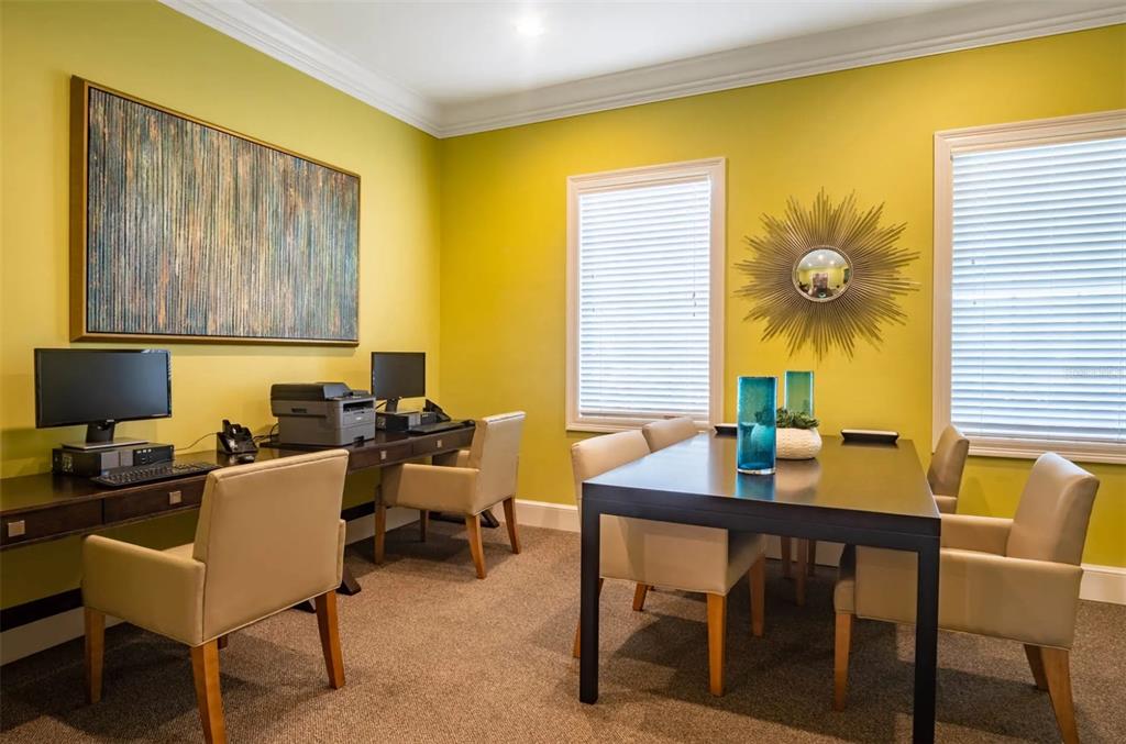 4248 Southeast Cove Lake Circle, Unit 3B06207 Stuart, FL 34997 - Photo 18 of 18 a view of a dining room with tables and chairs