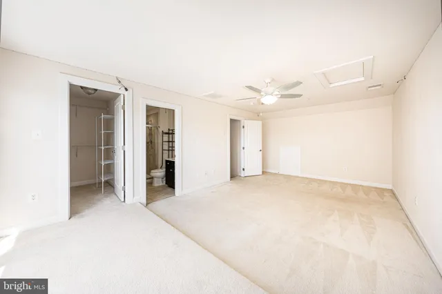 a view of multiple houses with a yard