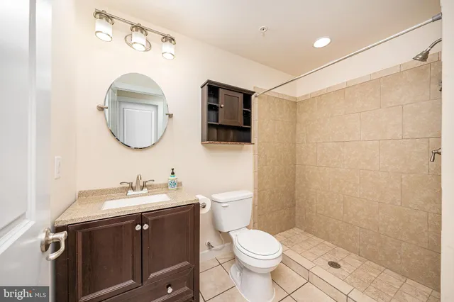 a view of livingroom with hardwood floor and a ceiling fan
