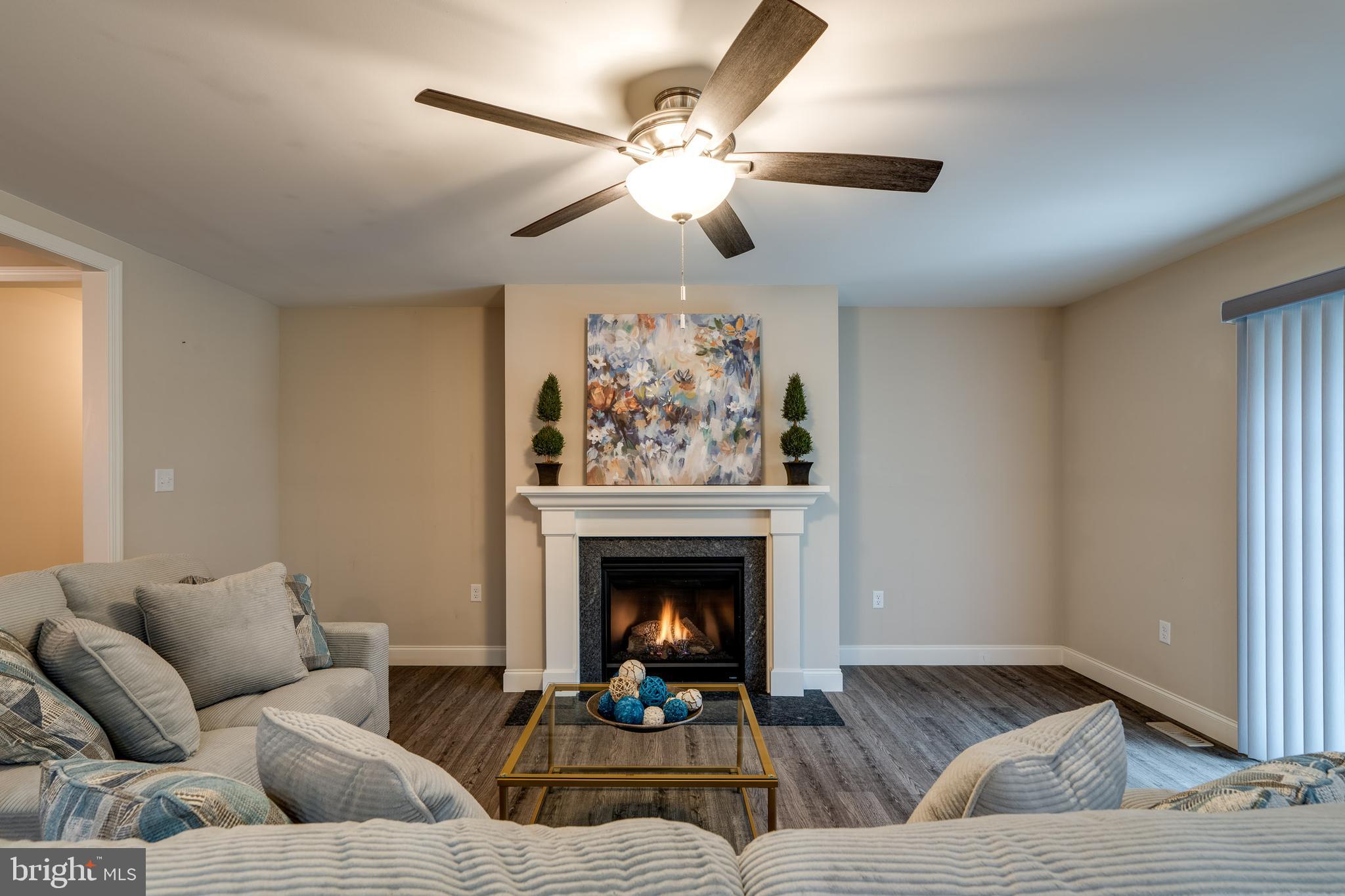 1400 Limestone Ridge Landisville, PA 17538 - Photo 10 of 50 a living room with furniture and a fireplace